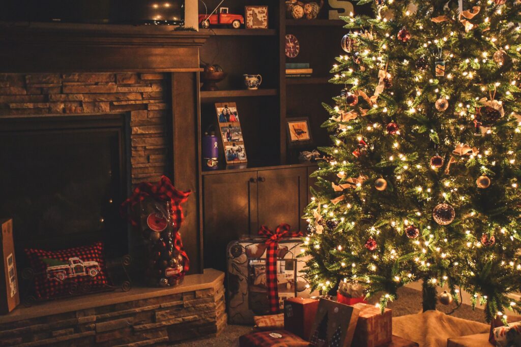 Glowing Christmas tree with presents underneath